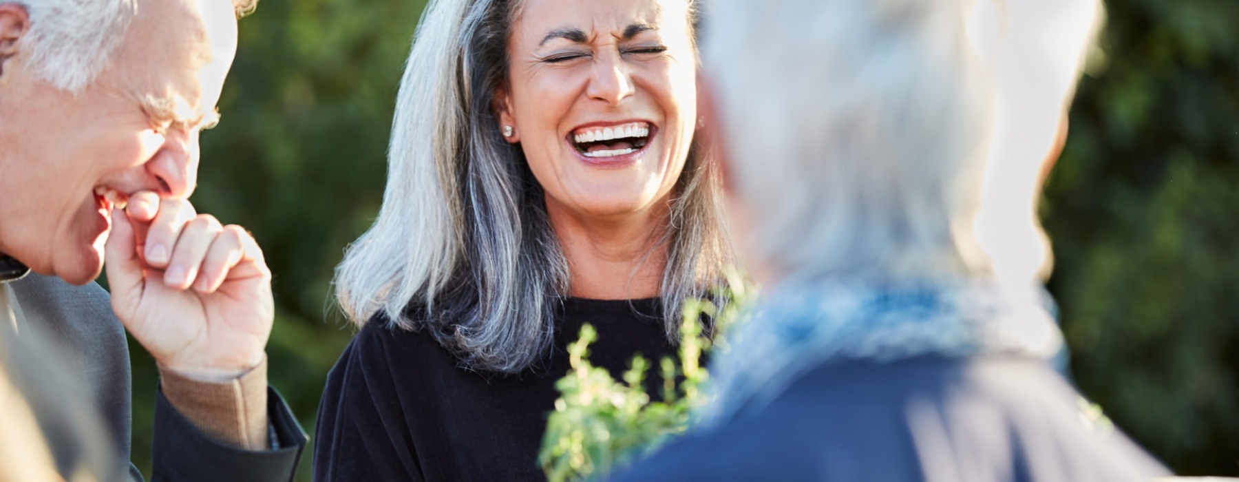 women laughing with friends